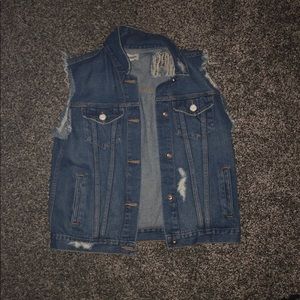 Distressed denim vest